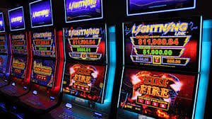 Live dealer at Playtech studio broadcasting blackjack game